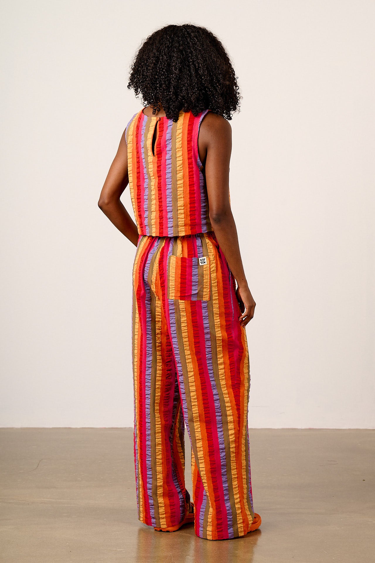 Norris - Wide Leg Cotton Trousers in Wide Rainbow Stripe