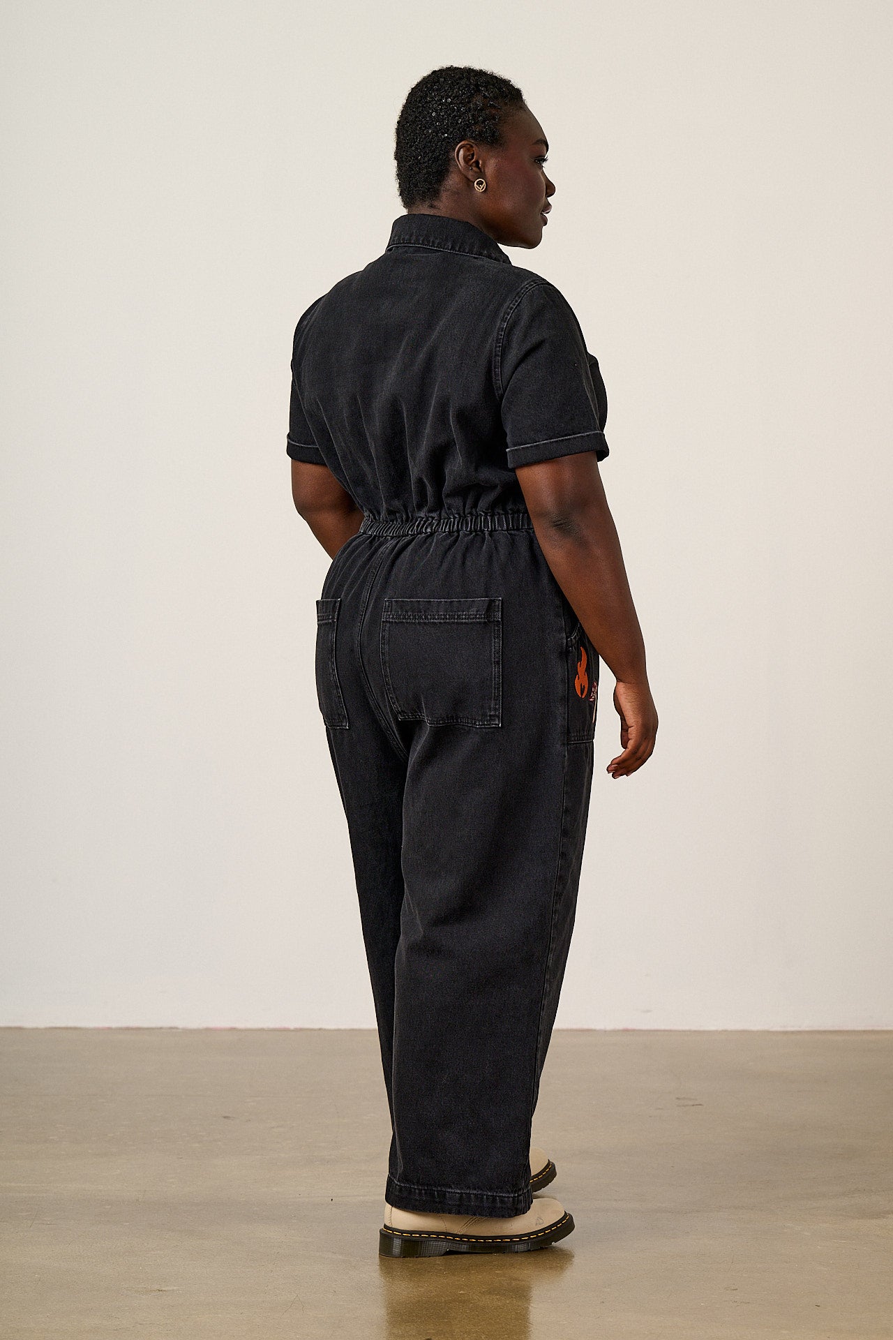 Ragan - Denim Jumpsuit in Washed Black with Punk Energy Patches