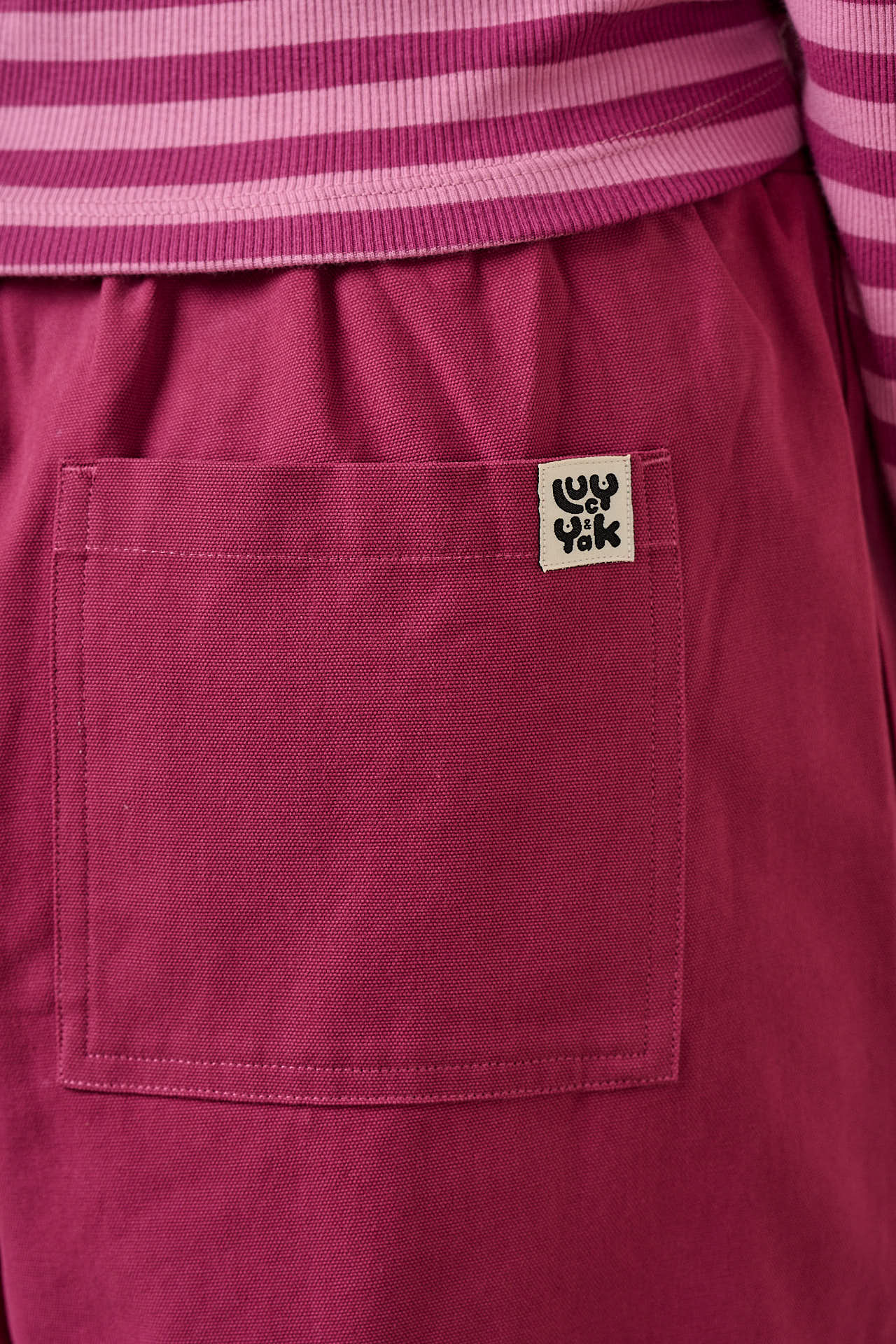 Chuck - Organic Cotton Wide Leg Trousers in Raspberry Matty