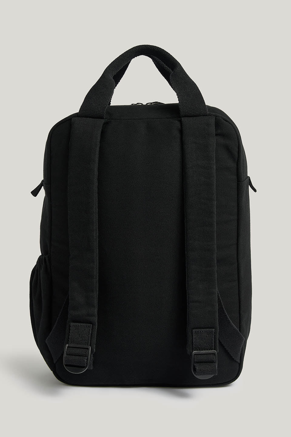Colby - Backpack in Black with Green Lining