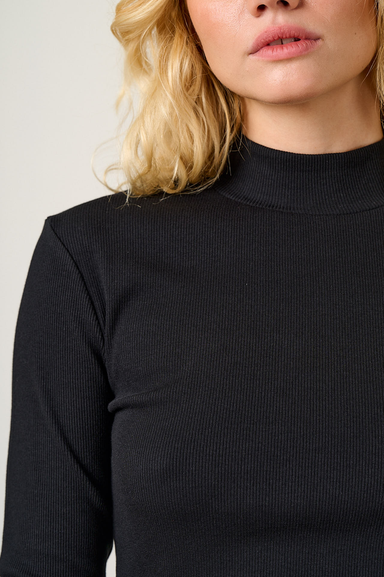 Tia - Cotton Ribbed Funnel Neck Top in Black
