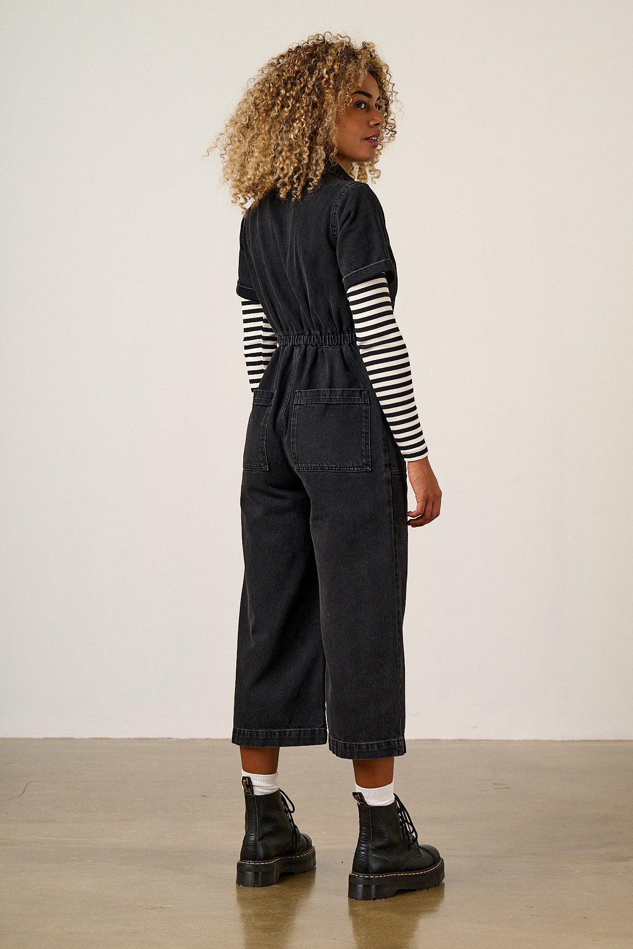 Ragan - Denim Jumpsuit in Washed Black with Punk Energy Patches