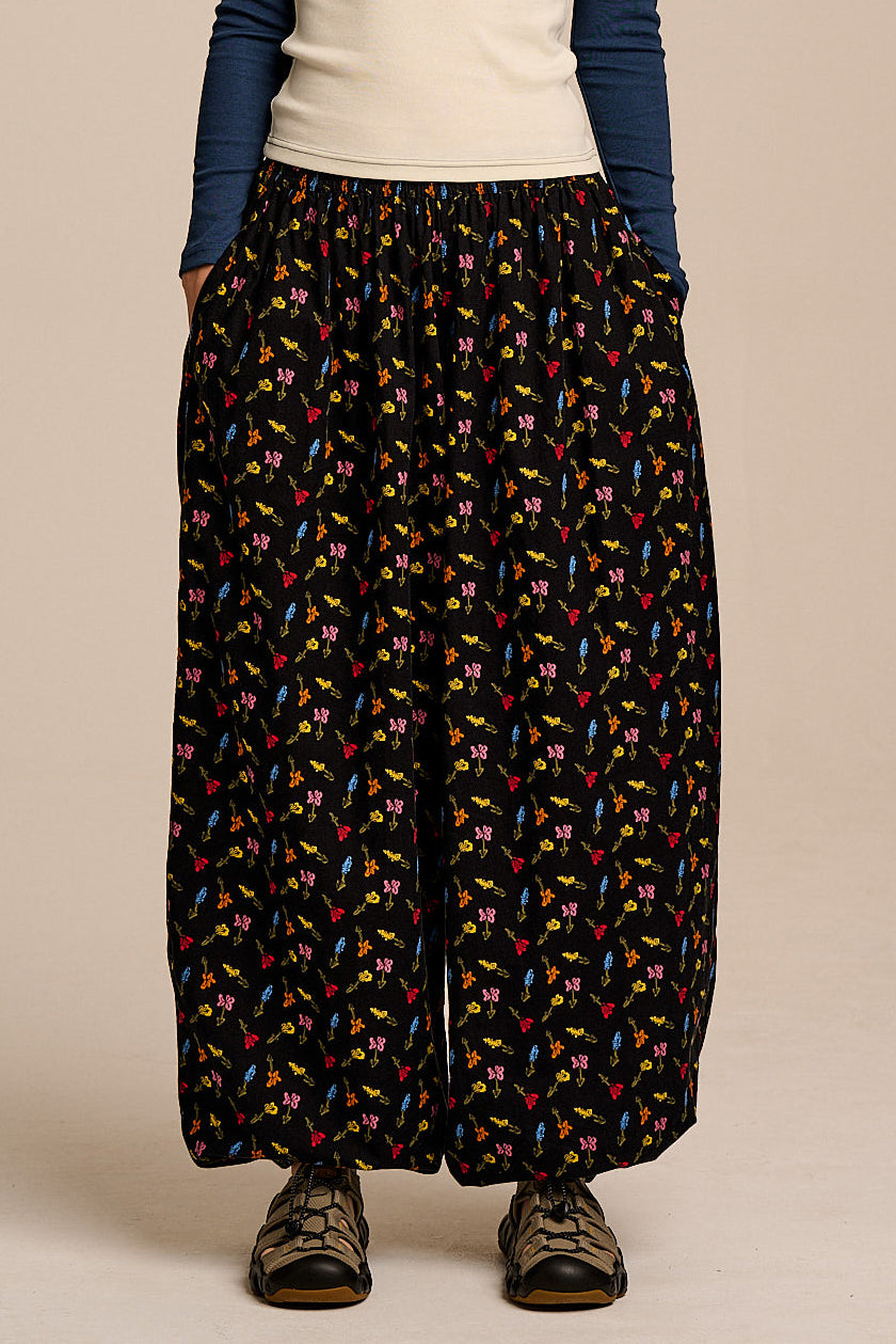 Renata - Cuffed Cotton Balloon Leg Trousers in Mini Tulips on Black