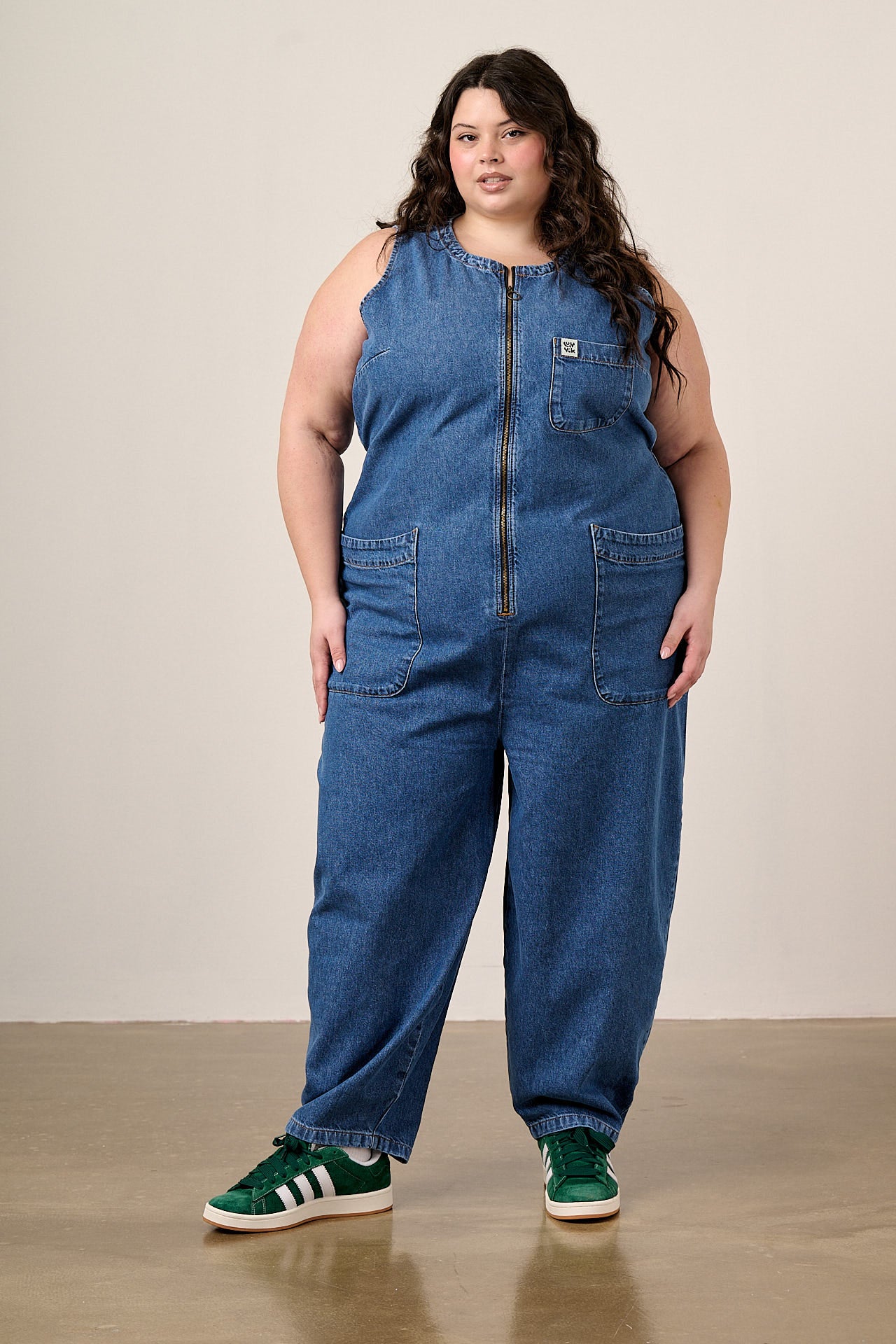 Nari - Light Weight Denim Sleeveless Jumpsuit in Mid Wash