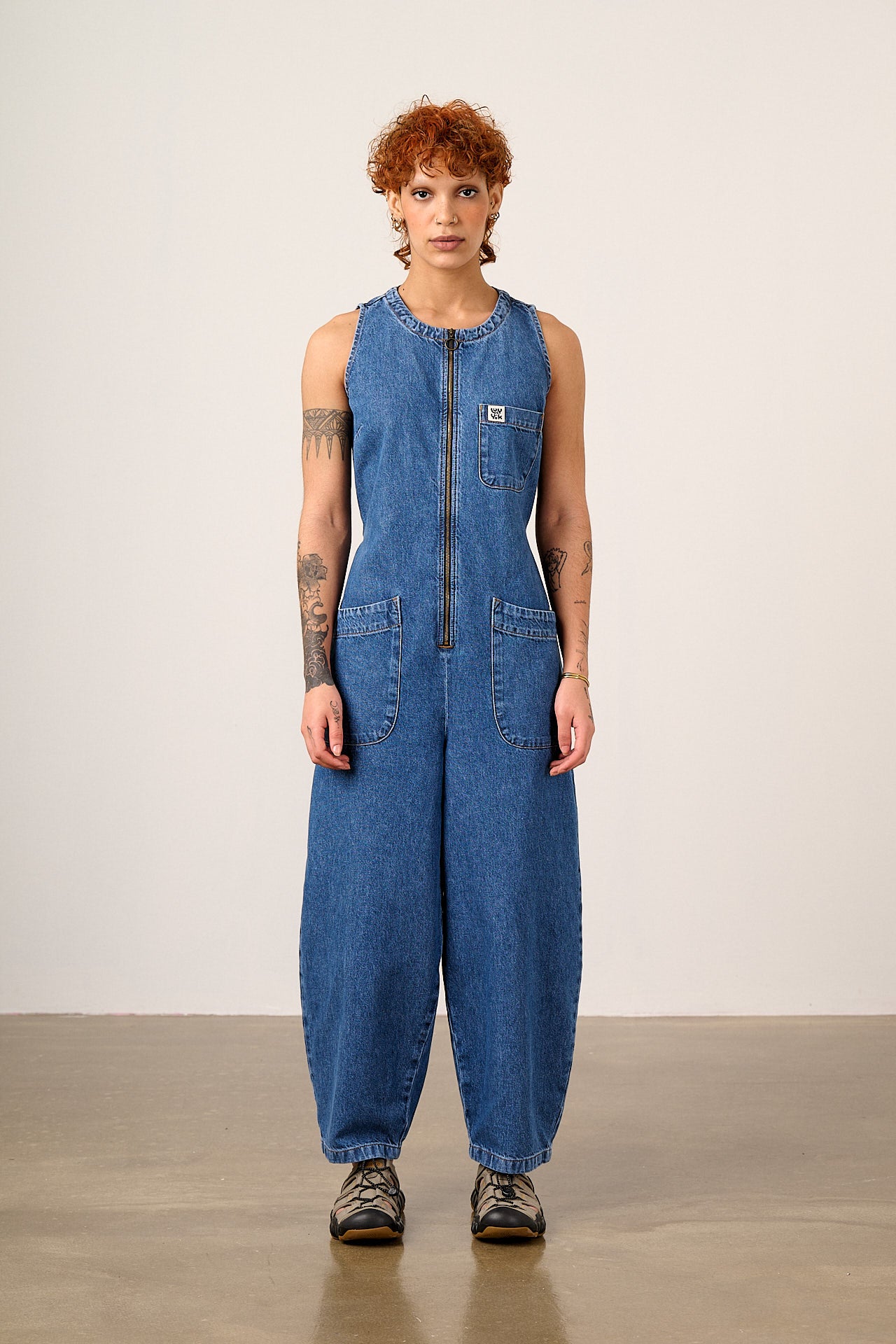 Nari - Light Weight Denim Sleeveless Jumpsuit in Mid Wash