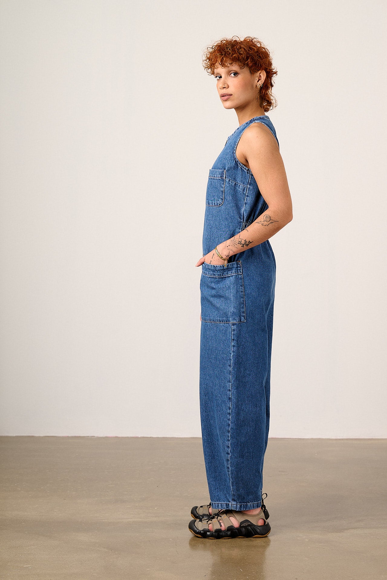 Nari - Light Weight Denim Sleeveless Jumpsuit in Mid Wash