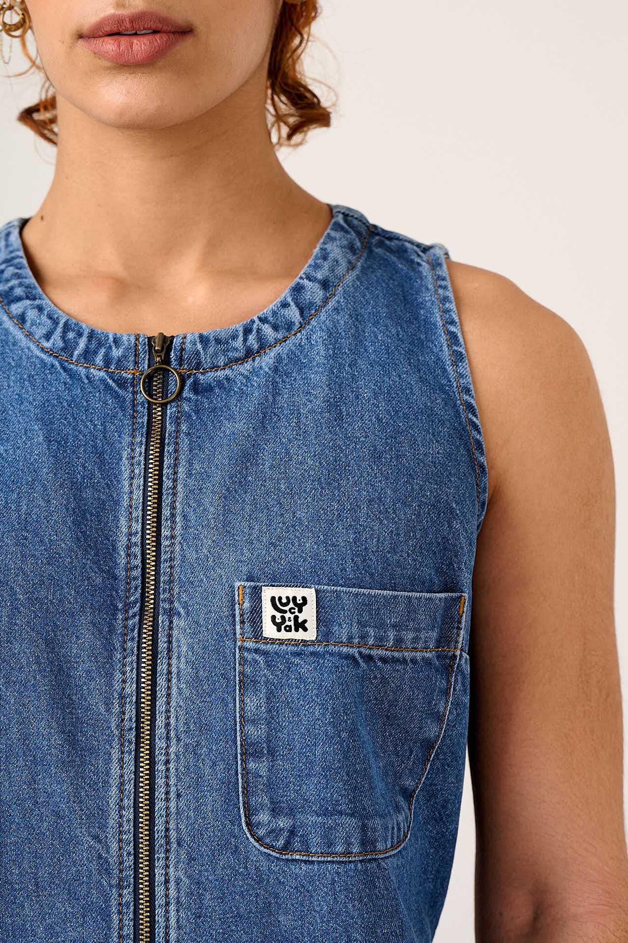 Nari - Light Weight Denim Sleeveless Jumpsuit in Mid Wash