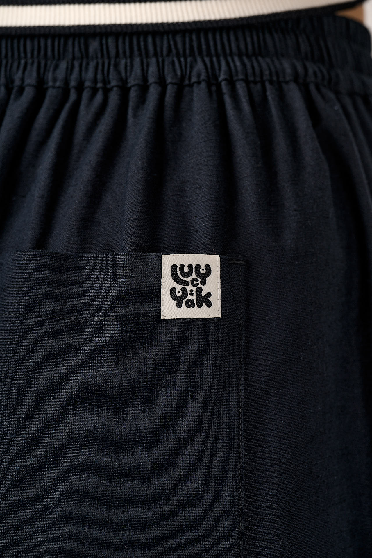 Renata - Cuffed Cotton Balloon Leg Trousers in Black