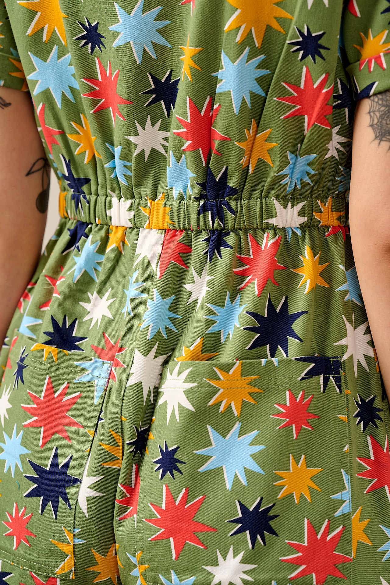 Riley - Cotton Playsuit in Green Cosmic Folk Stars