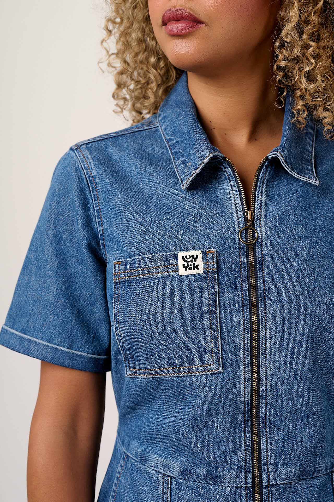 Riley - Denim Playsuit in Mid Wash Blue